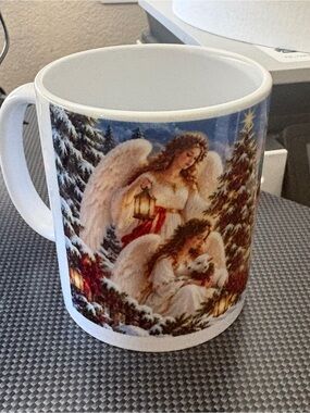 Winter Wonderland Snowman Ceramic Mug - White and Red
Angel Christmas Mug